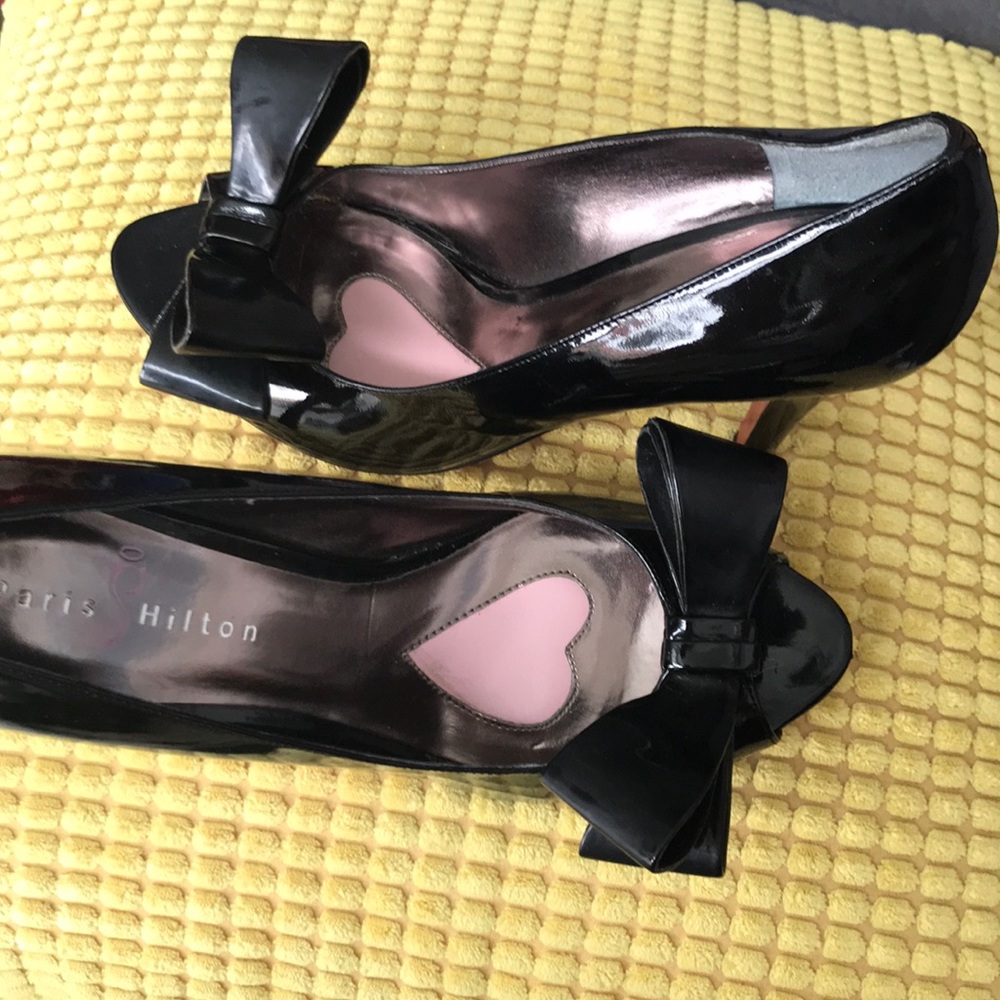 Black patent leather peep toe heels